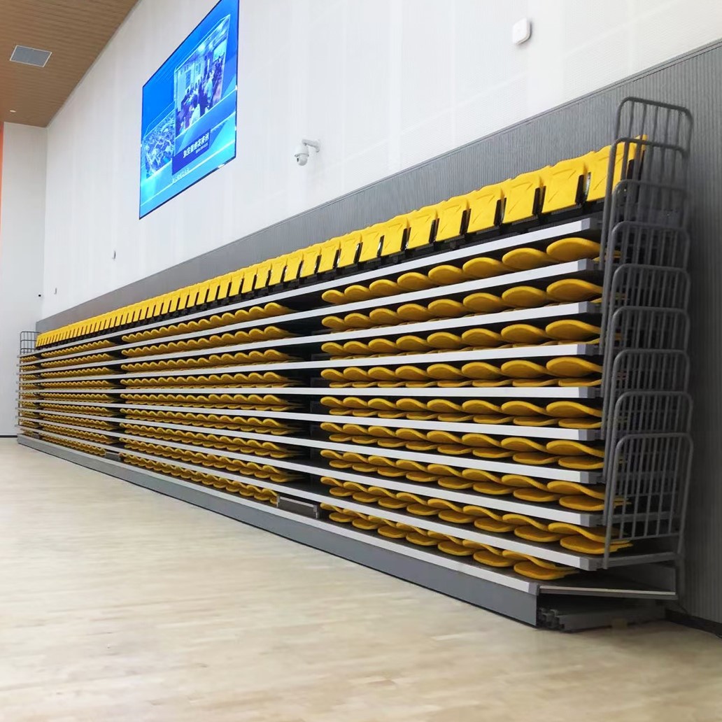 Rear-mounted retractable grandstand seats Rear-mounted retractable grandstand seats